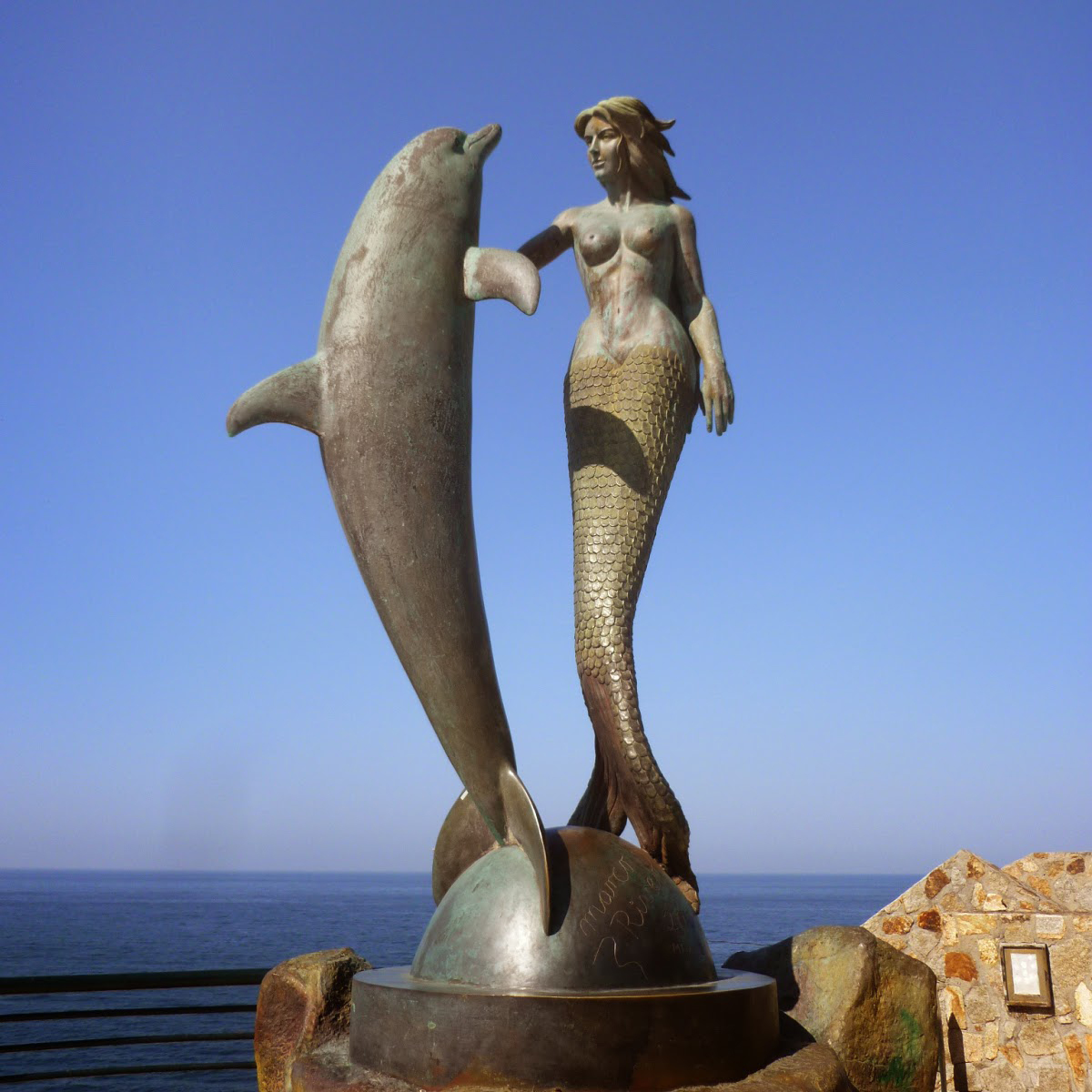 antique bronze  mermaid  sculpture with dolphin